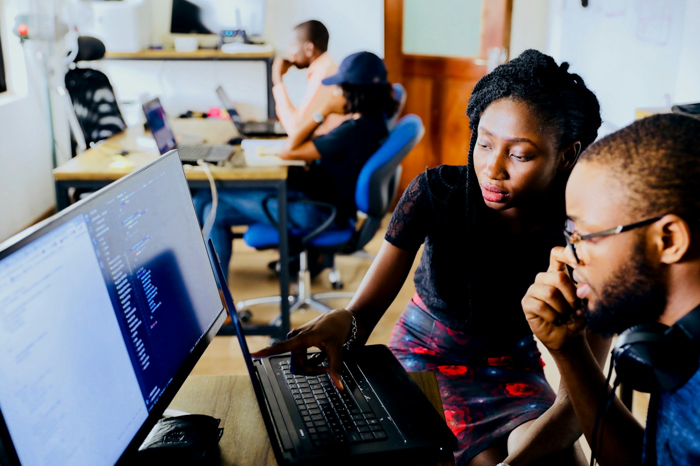 Engineers reviewing code together