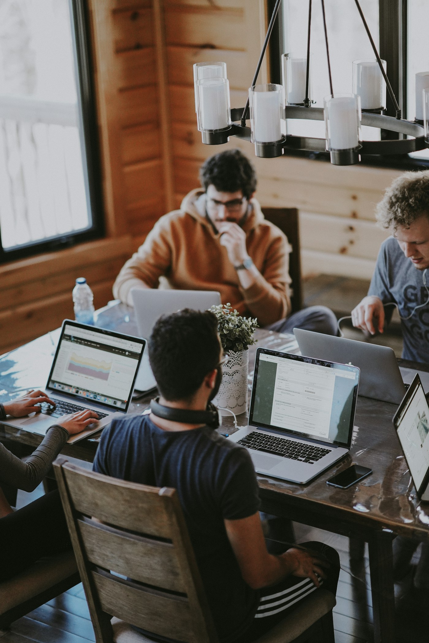 People working at a shared desk