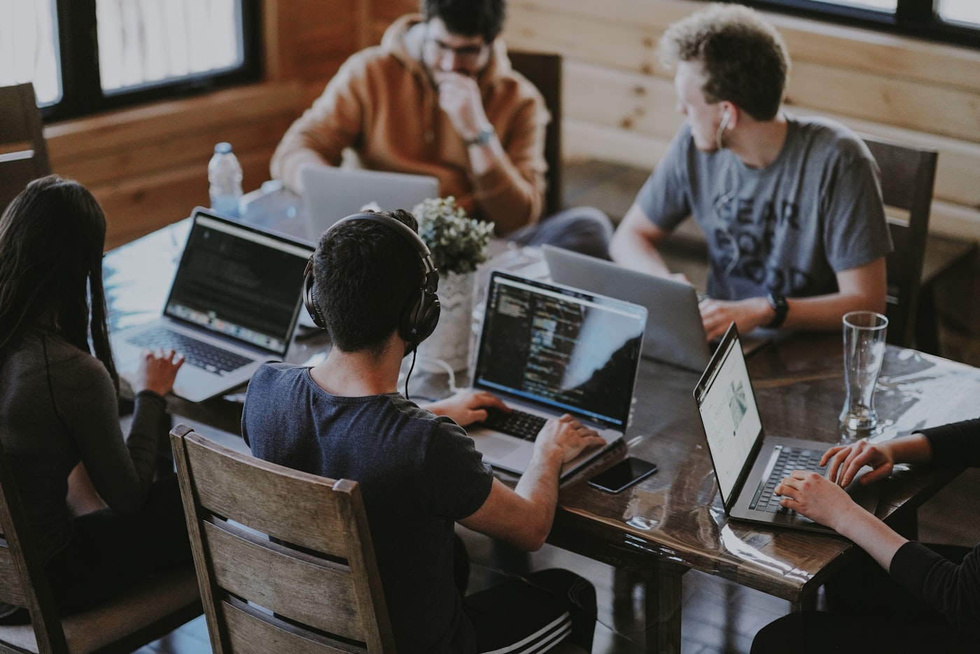 A team working together on laptops